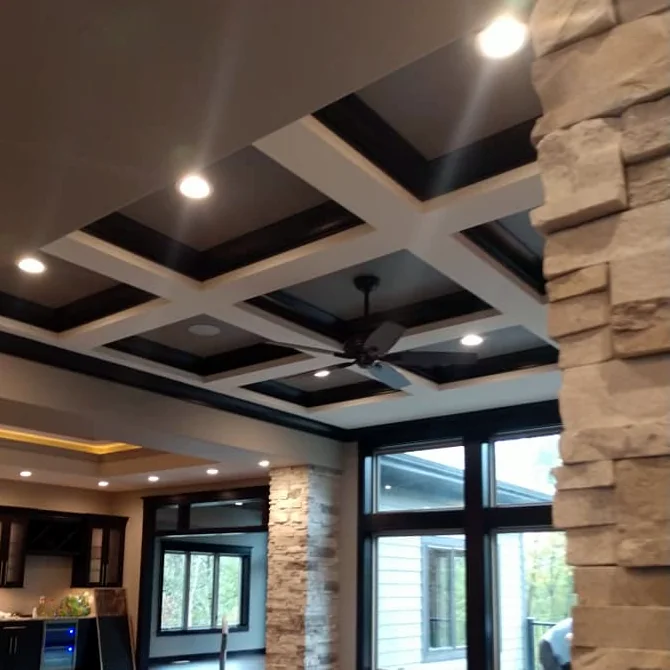 Coffered ceiling, trim and walls painted by Full Spectrum Painting in a new-construction home